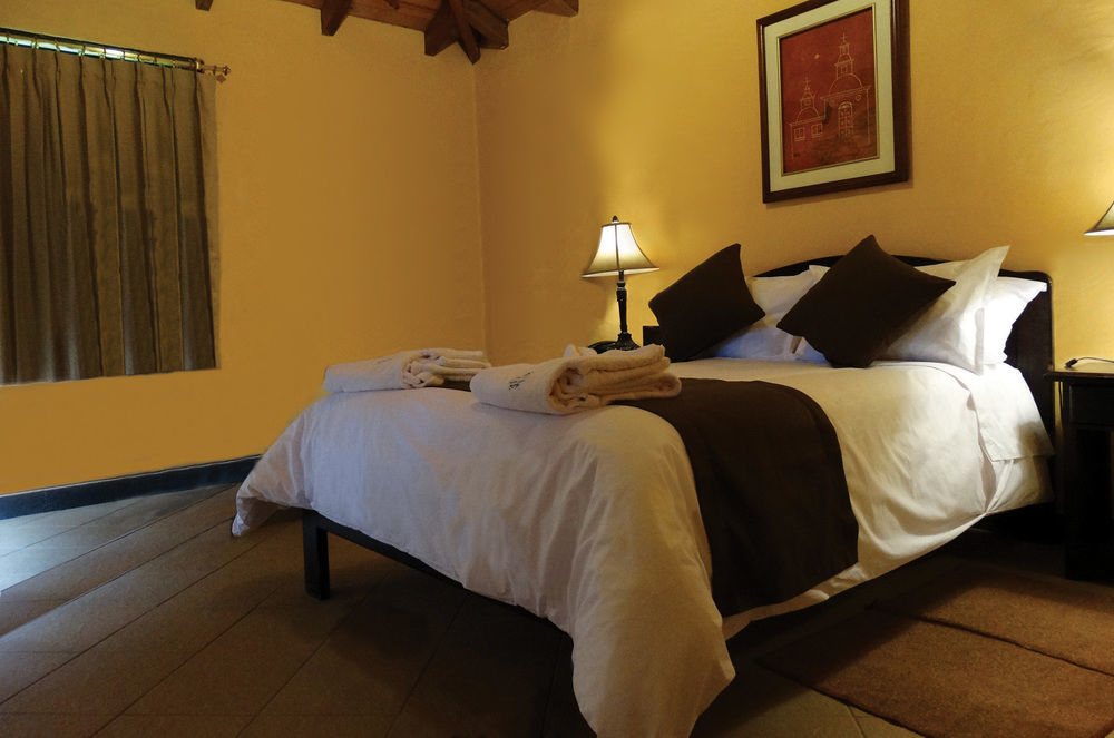 Termas De Папалакта Екстериор снимка A bedroom at the hotel